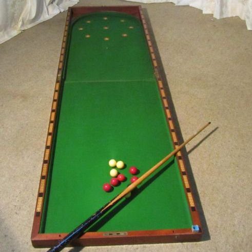 The traditional game of Old English Bagatelle.