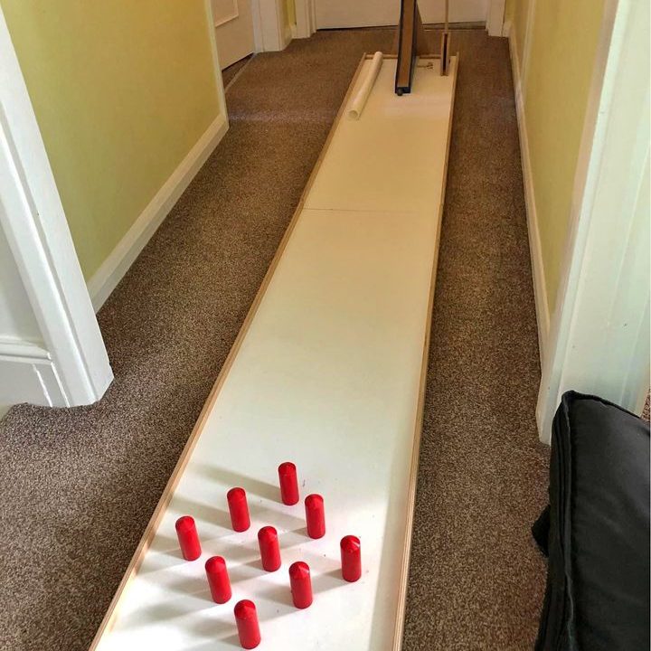 Our Boomerang Skittles set up in the hallway of a house for an indoor Family Party.