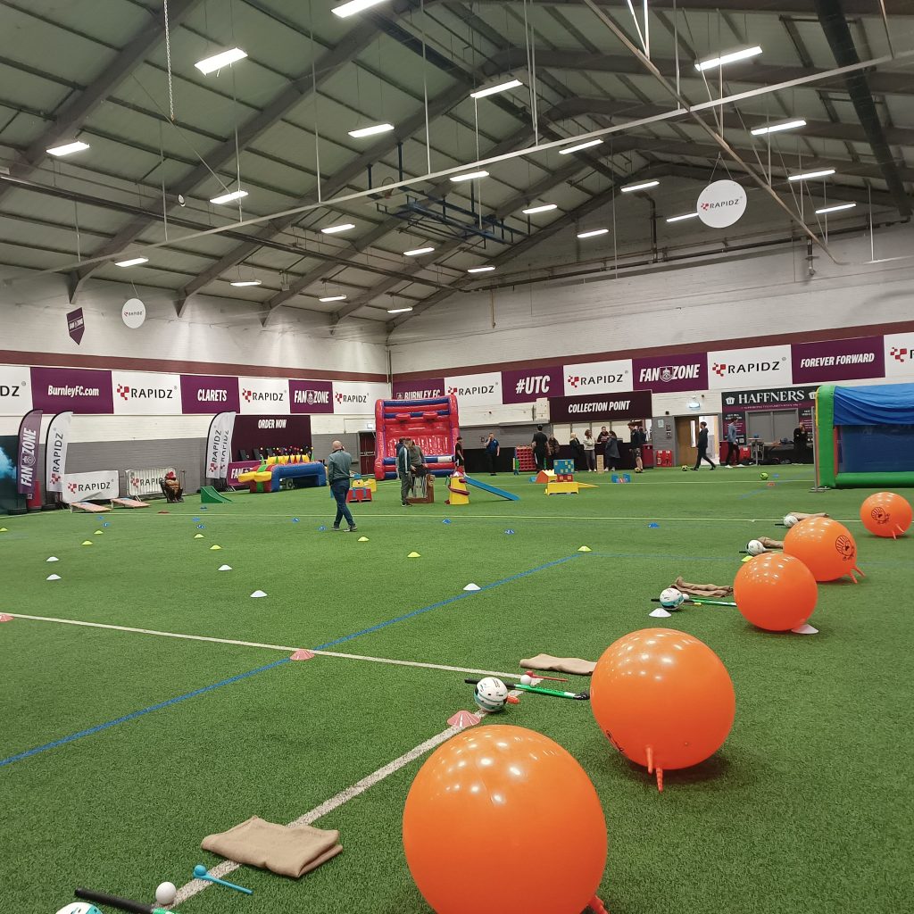 A School Sports Day event set up with Cone Markers, Space Hoppers, Crazy Golf and more.