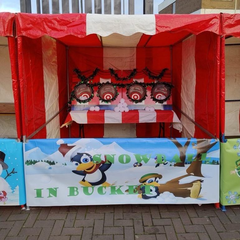 Christmas festive signage for our classic game throwing soft snowballs into buckets with tinsel and decorations.