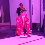 Different people in various fancy dress playing with our Curling lane.