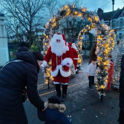 Father Christmas greeting the children