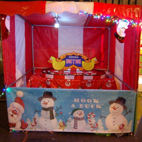 Christmas festive signage for classic Side Stall game where players try to Hook a Santa duck with tinsel, lights and decorations.