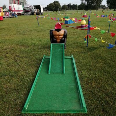 Our infamous, one-of-a-kind Gorilla Golf Putt Challenge set up next to our Crazy Golf course and bunting.