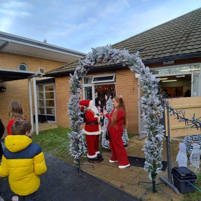 Singing Santa and Festive Archway